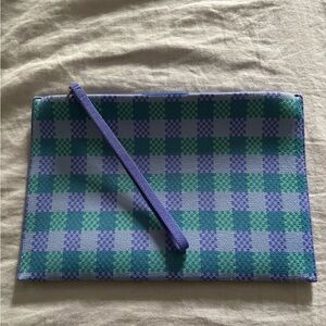 Rothy's The Wristlet in blue and green check pattern